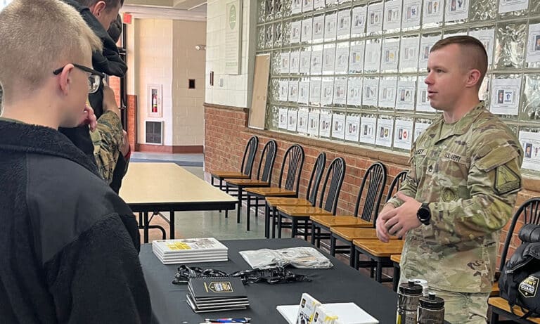 A representative of the US Army shares information with cadets on a recent campus visit.