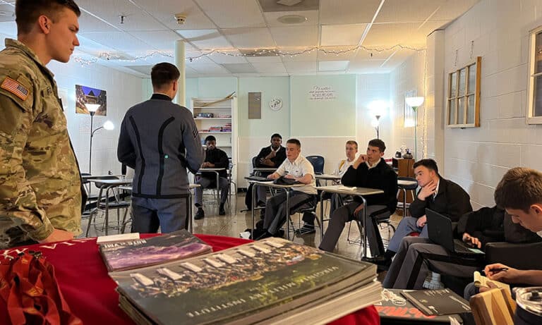 Representatives from Virginia Military Institute visit with interested cadets during a visit to the Fork Union campus.